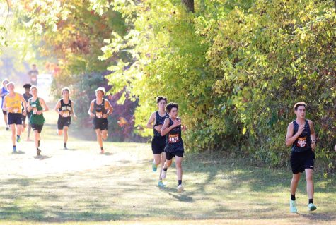 The boys XC team keeps a steady pace at the Downriver Jamboree II at Patriots Park October 4.