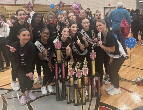 The Varsity team wins first place overall and grand champions at their final competition of the season.