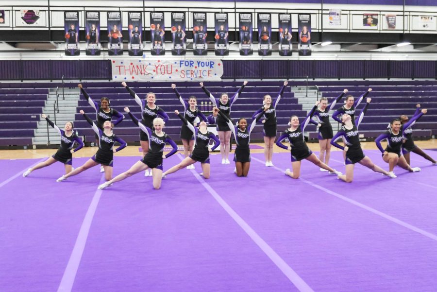 The competitive cheer team fires up at their home competition in January.