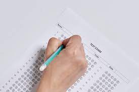 Student takes final exam.