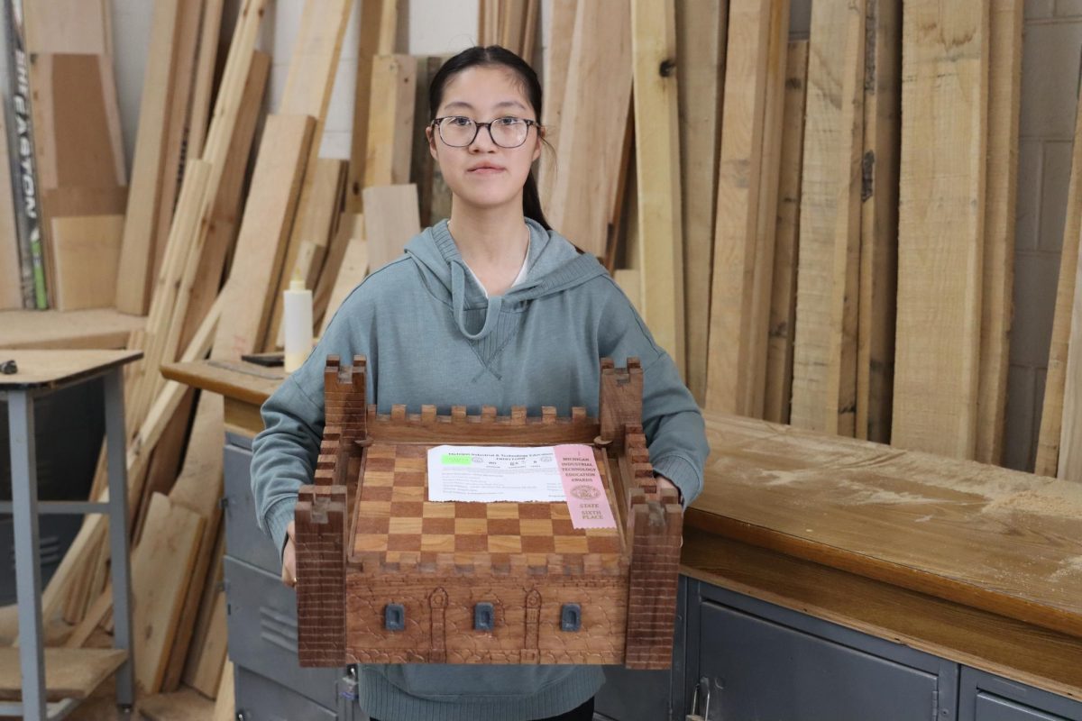 Senior Kylie King had not only one, but two projects sent to competition. The first project, an excellent display of woodwork, is a chess board made to look like a castle. The second project is a table with legs that can fold inwards and make it more accessible for different surfaces. King uses woods such as mahogany, pine, and cherry in the projects. Although she ran into some obstacles in the process of making these pieces, she placed 6th and 5th in the state. 
